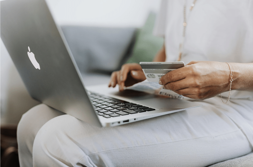 A person online shopping on their computer.